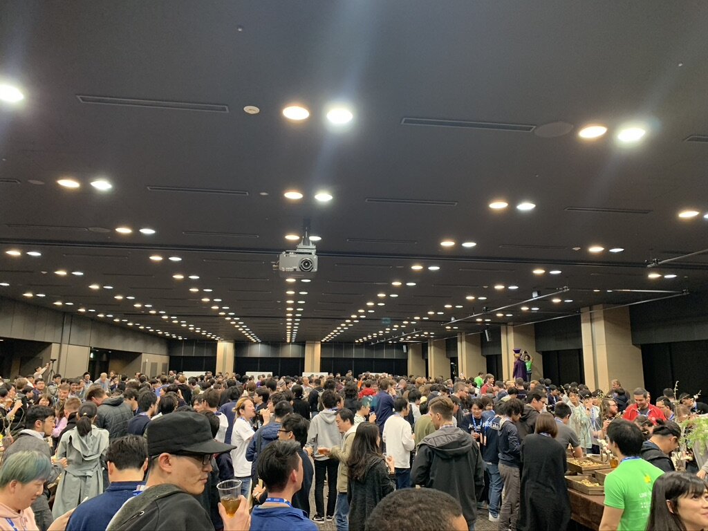 I talked with peoples while waiting in a row to pick some foods.